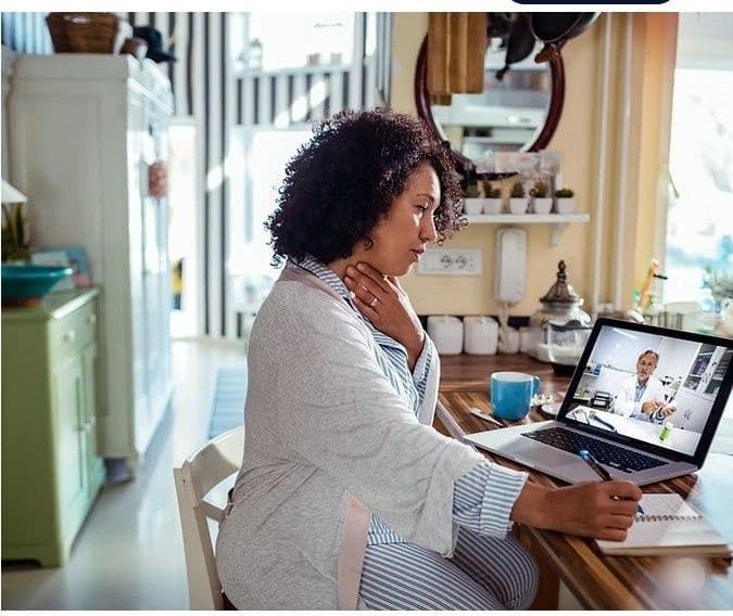 Patient on a telehealth video call with a provider